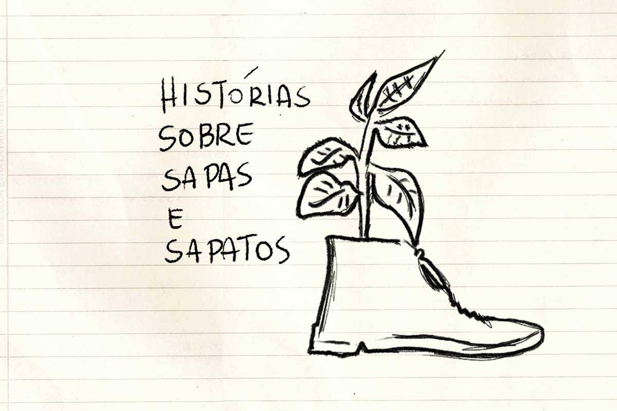 Em uma folha de caderno está o desenho de um sapato com uma planta brotando dentro dele. Ao lado está a frase “Histórias sobre sapas e sapatos”